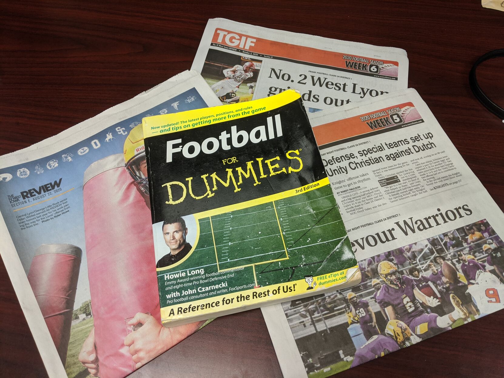 Lydia learns from "Football for Dummies"